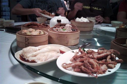 a selection of dim sum goodies on a lazy Susan