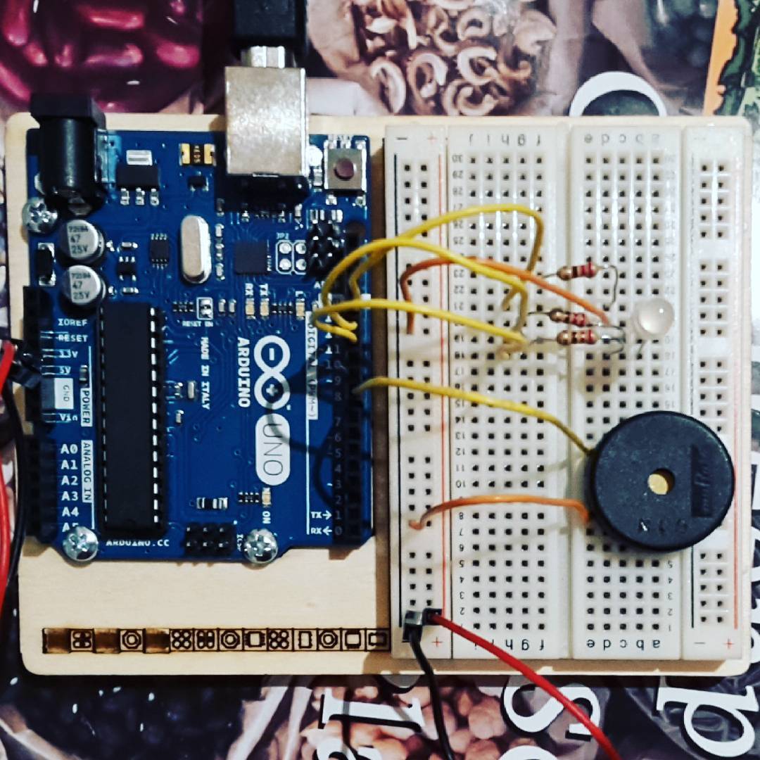 an arduino hooked up to a breadboard, c. 2016