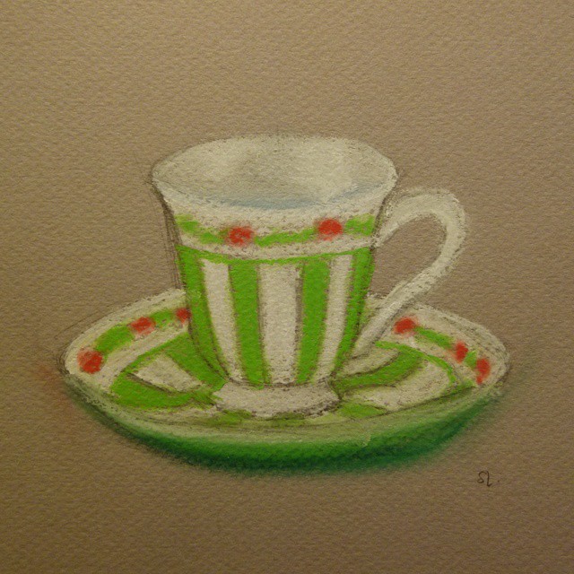 11: Pastel crayon drawing of green and white striped teacup and saucer