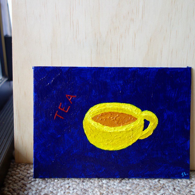 2: Acrylic painting of a yellow teacup on blue background