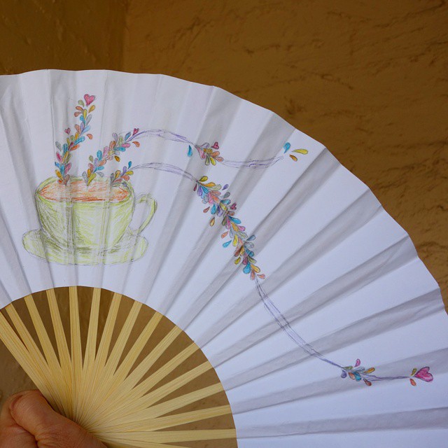 28: Pencil and coloured pencil sketch of a teacup on a paper fan