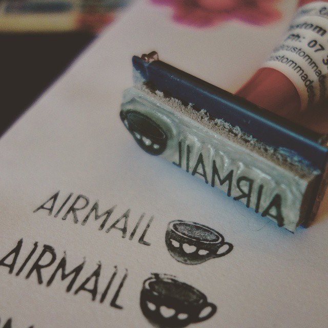 46: Airmail rubber stamp featuring a teacup icon