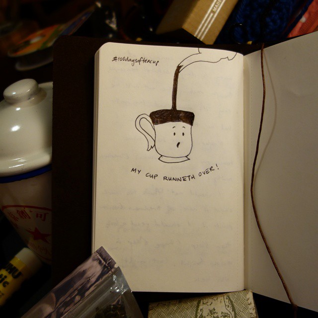 48: Black ink drawing of a teacup looking surprised as it overfills with tea. Caption reads: My cup runneth over