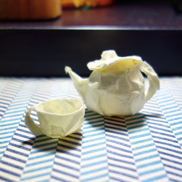 53: Tiny three-dimensional teacup and teapot sculpture made from masking tape