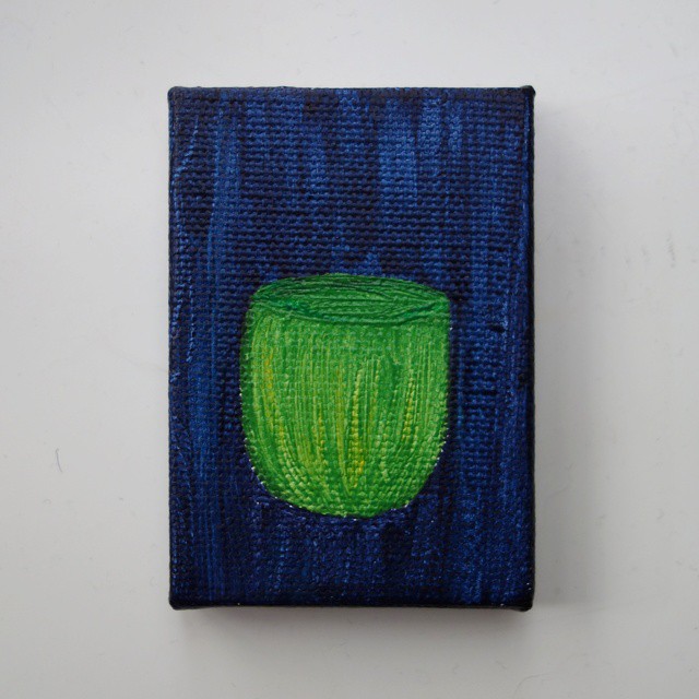 68: Acrylic painting of a green teacup on blue background on canvas
