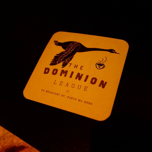 83: A tiny black marker teacup drawn onto a coaster from The Dominion League bar in Perth, WA