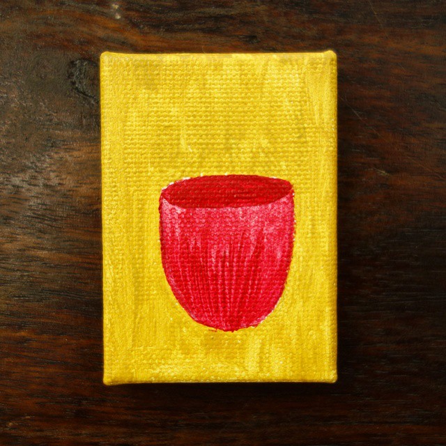 85: A red teacup on a yellow background, acrylic on canvas