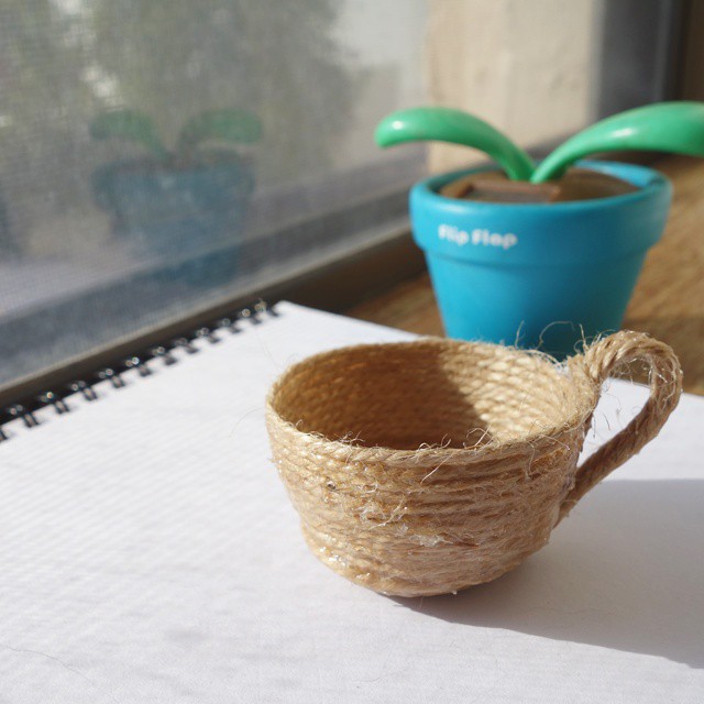 9: Three-dimensional teacup sculpture made from twine and glue