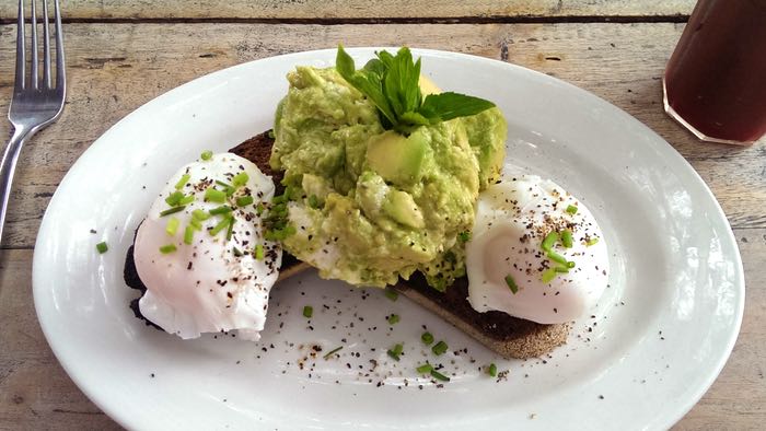 avo and poached eggs at Evviva Cafe