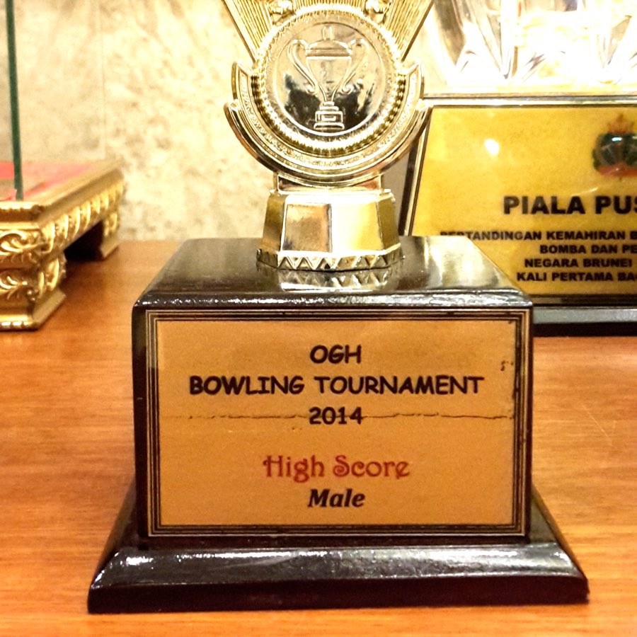 a bowling trophy full of fonts