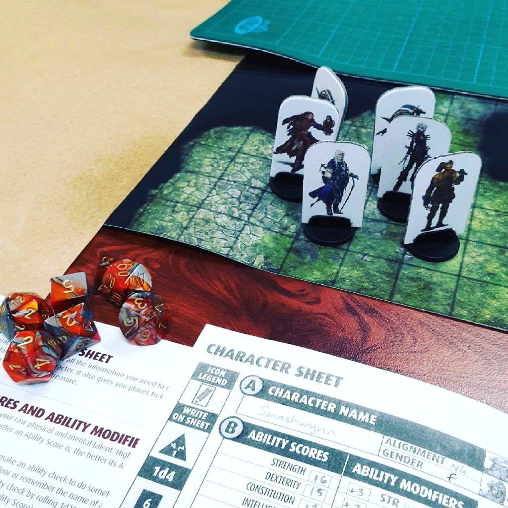 party, dice and character sheet