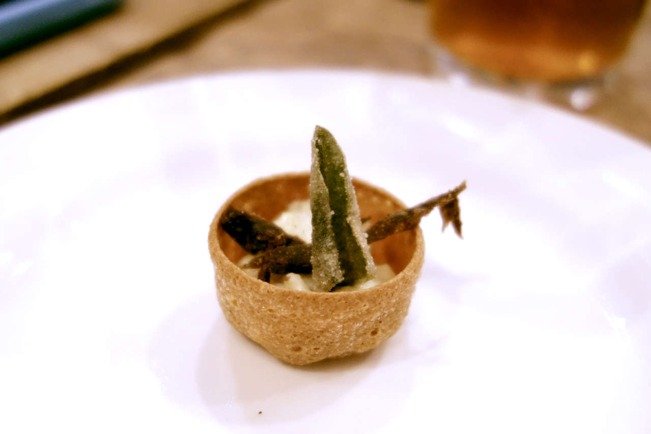 Truffled emu egg entree served in a crispy cup