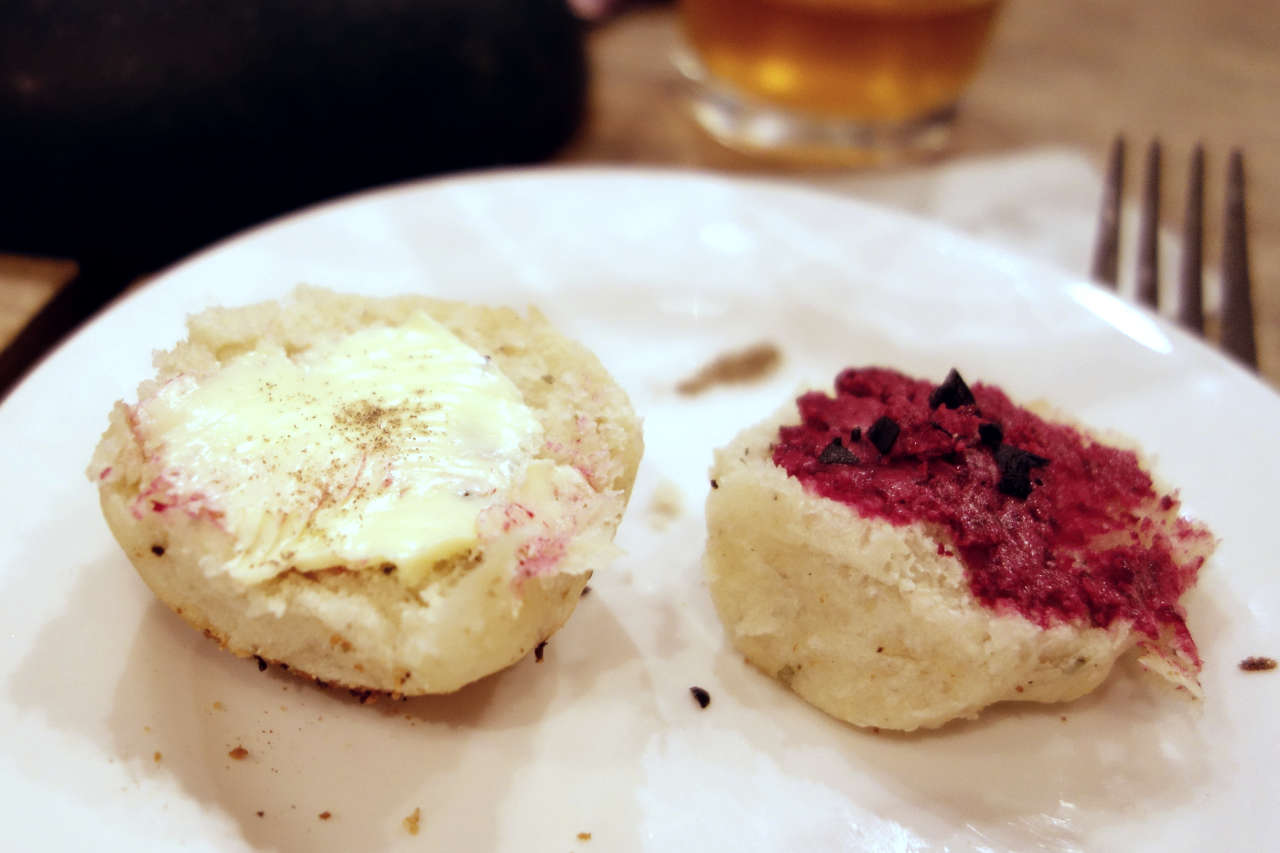 Two halves of bush bread with native spreads