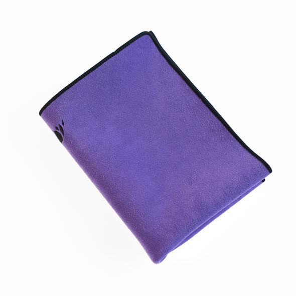 Purple NEO WAYmat folded into a rectangle. Source: We Are Yoga